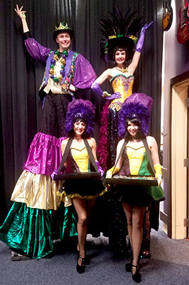 Mardi Gras stilt walkers